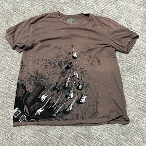 brown guitar shirt